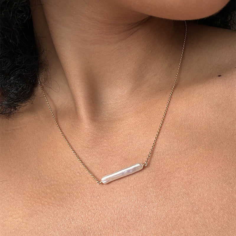 maris pearl bar necklace worn angled on neck